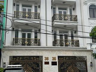 Có thang máy !!!! tòa nhà mới xây 100% mtkd đường 20m bình phú 1  9x20m 5 tầng  có hệ thống pccc