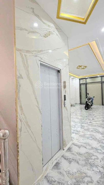 Có thang máy !!!! tòa nhà mới xây 100% mtkd đường 20m bình phú 1  9x20m 5 tầng  có hệ thống pccc