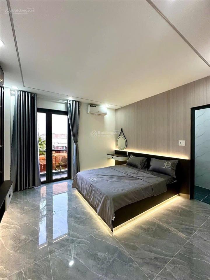 Cho thuê nhà mới xây 100% dt 5x20m 1trệt 4lầu 5pn 6wc sân rộng đậu 2 xe hơi full nội thất cao cấp