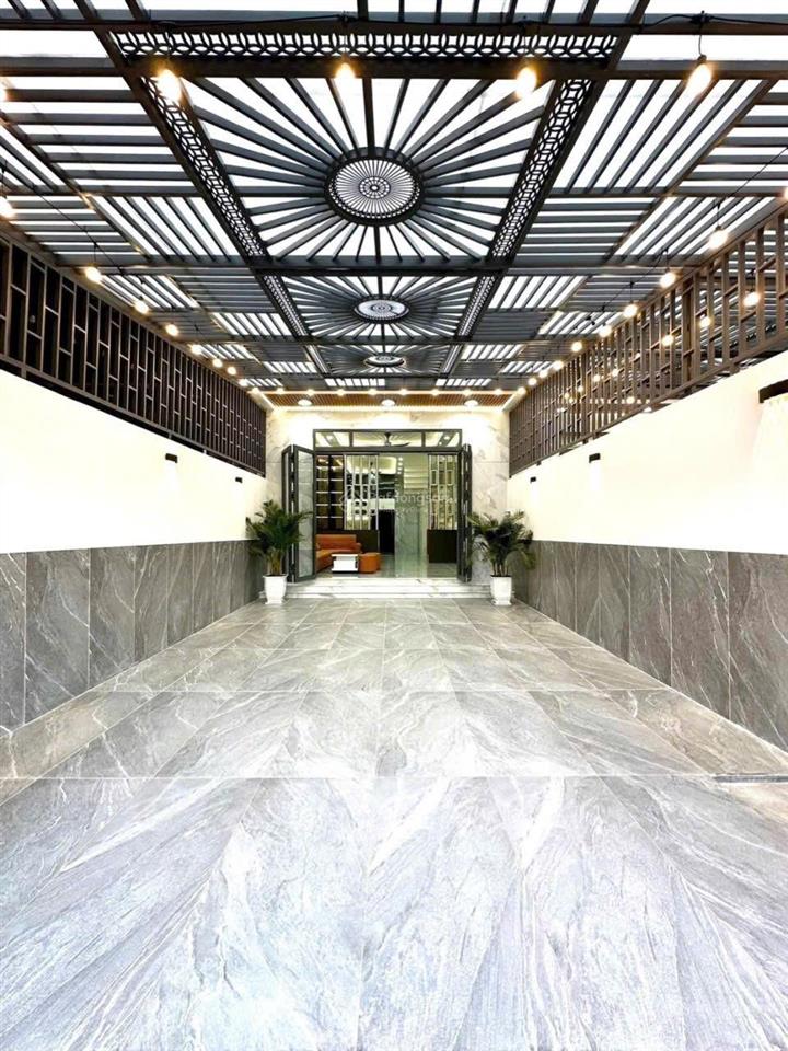 Cho thuê nhà mới xây 100% dt 5x20m 1trệt 4lầu 5pn 6wc sân rộng đậu 2 xe hơi full nội thất cao cấp