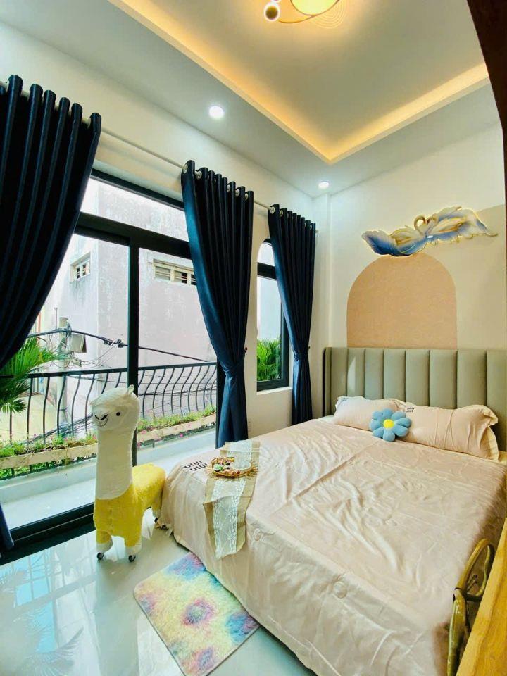 Mặt tiền kinh doanh Trưng Nữ Vương sát chợ Hóc Môn 7*15 trệt 3 lầu 8 phòng cho thuê