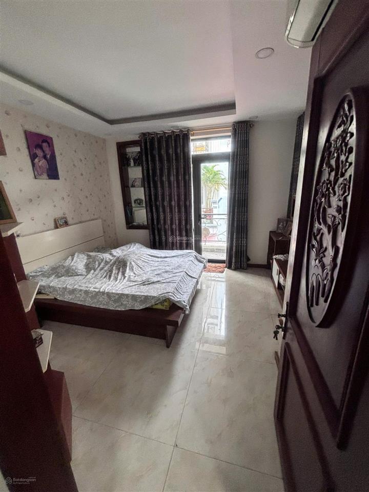 Giá giảm cực sốc nhà hẻm xe hơi thống nhất, p. an hội động, dt 5,6 x10,6m  5 tầng