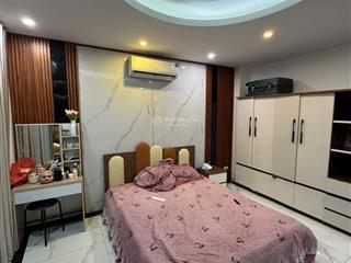 255 nguyễn khang cho thuê nguyên tầng 70m2 gồm 2 phòng 1 ngủ, 1 khách, bếp ngăn riêng