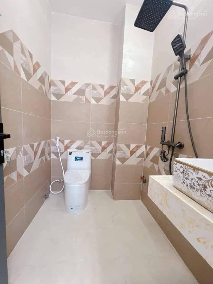 Bán nhà mới 100% đường 55 kdc bình phú