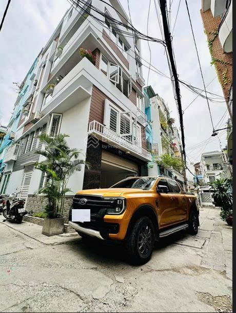 Bán nhà đường huỳnh văn bánh  quận phú nhuận  5x10  4 lầu  13.6 tỷ  0908 879 *** tuấn