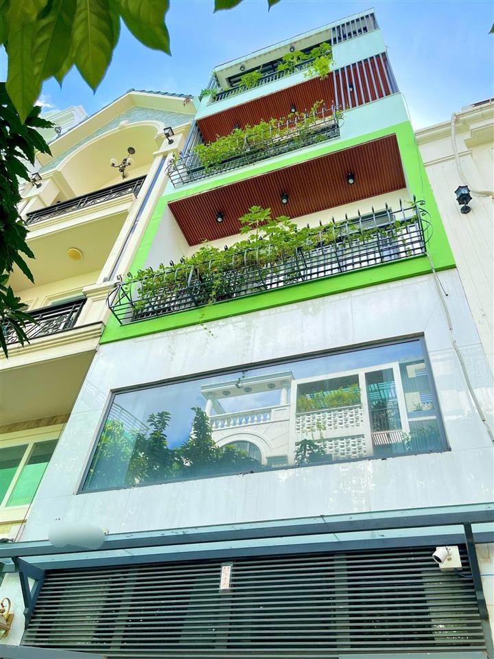 Bán nhà khu compound có công viên 12m, 5 lầu54m² 4pn5wc chỉ nhỉnh 12,x tỷ ngay quang trung