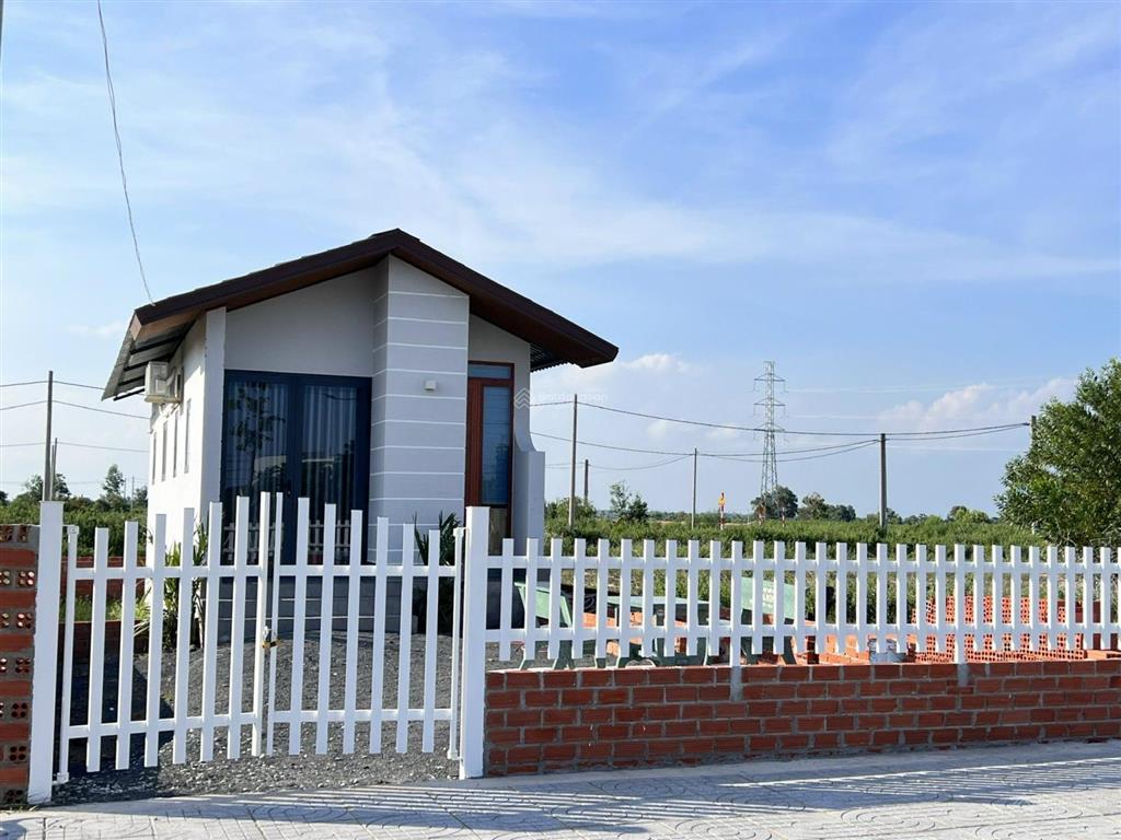 Bán căn nhà nhỏ xinh 2 pn  gần biển phước hải. dt đất 155m2 (7x22m) full thổ cư mt đường nhựa