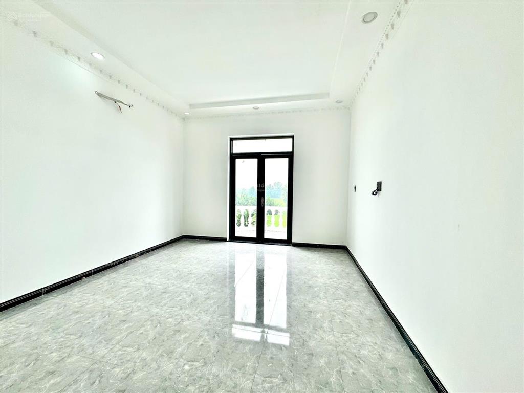 Bán nhà 1 trệt 2 lầu đối diện ubnd xã phước lý mới  giá 3,1 tỷ