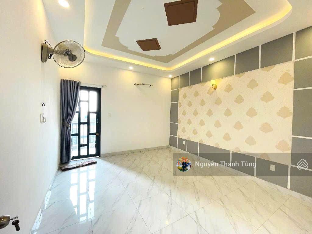 Nhà 4 tầng mặt tiền đường hiệp thành 17, tân thới hiệp  dt 92m2, ngang 4m, gần chợ hiệp thành.