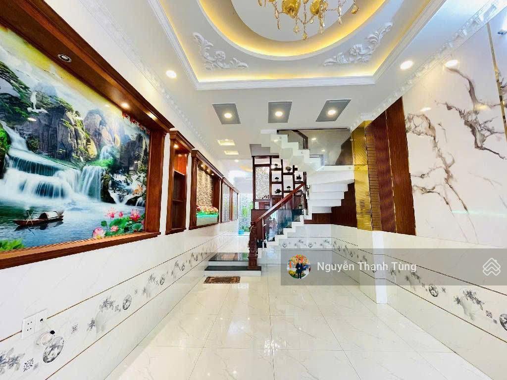 Nhà 4 tầng mặt tiền đường hiệp thành 17, tân thới hiệp  dt 92m2, ngang 4m, gần chợ hiệp thành.