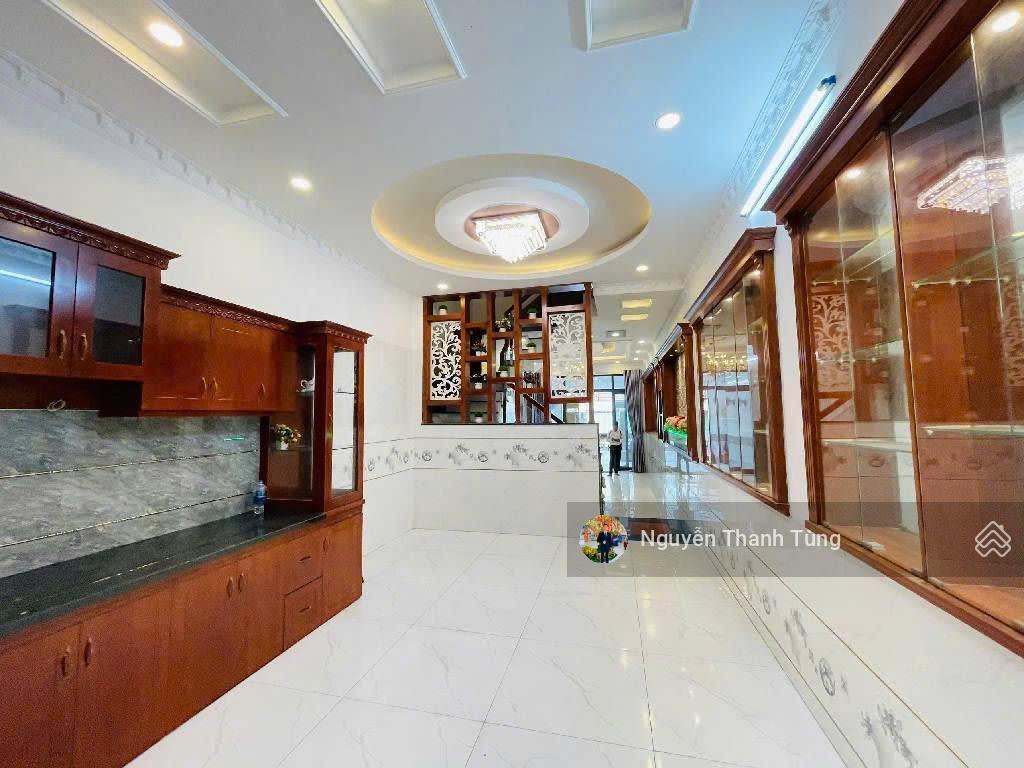 Nhà 4 tầng mặt tiền đường hiệp thành 17, tân thới hiệp  dt 92m2, ngang 4m, gần chợ hiệp thành.