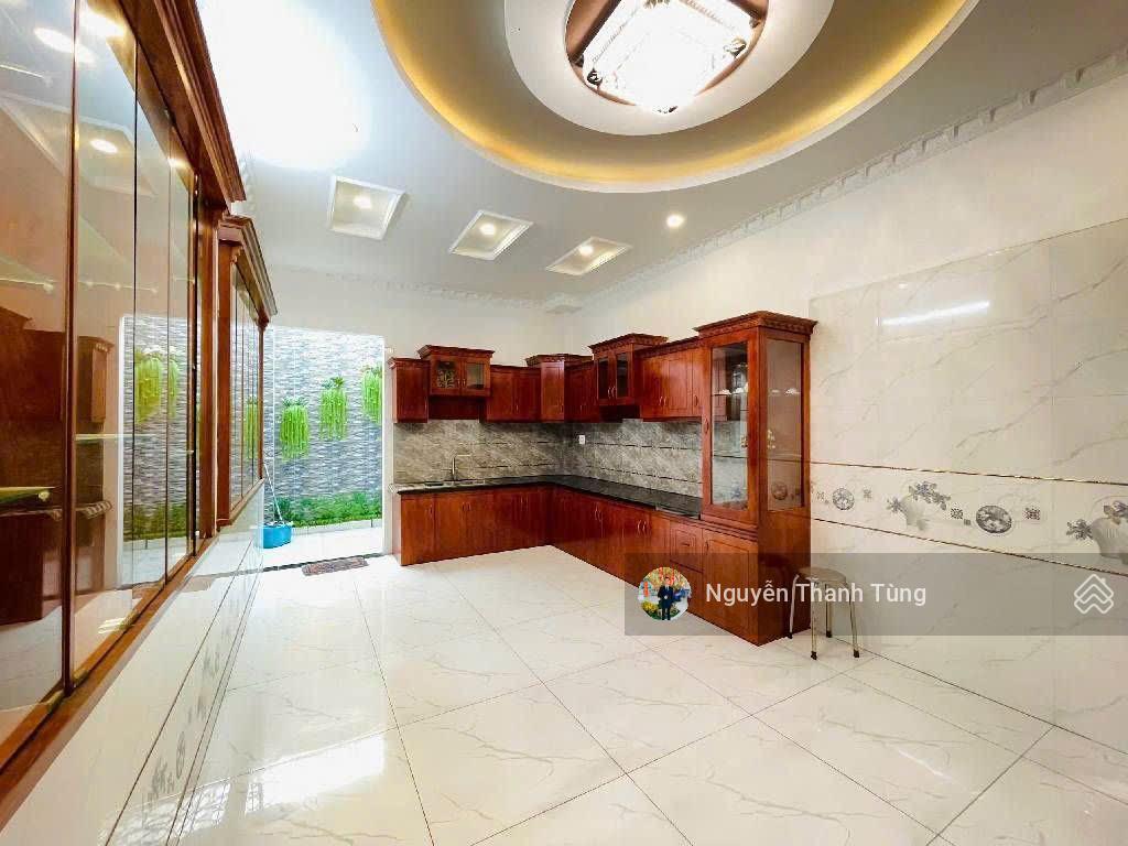 Nhà 4 tầng mặt tiền đường hiệp thành 17, tân thới hiệp  dt 92m2, ngang 4m, gần chợ hiệp thành.