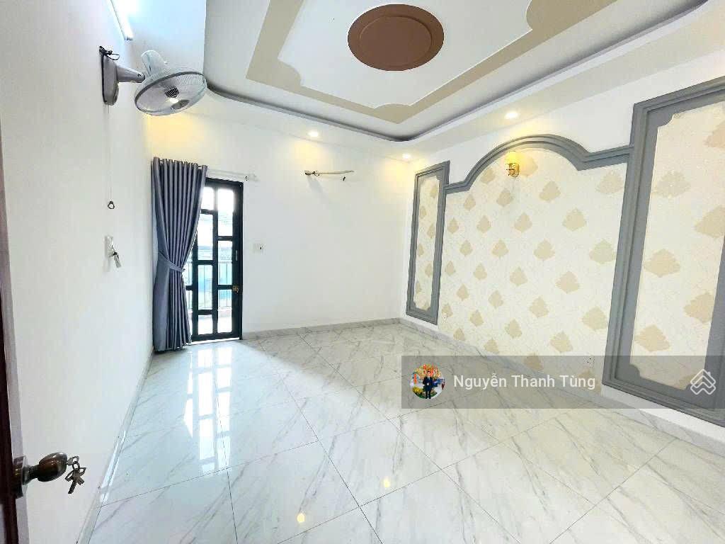 Nhà 4 tầng mặt tiền đường hiệp thành 17, tân thới hiệp  dt 92m2, ngang 4m, gần chợ hiệp thành.