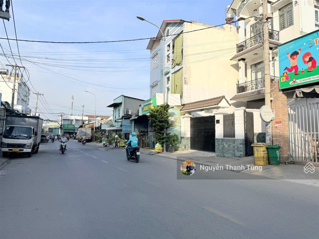 Gấp bán lô đất mặt tiền đường nguyễn thị nhuần, an phú đông, dt 110m2 (4 x 28), full thổ cư