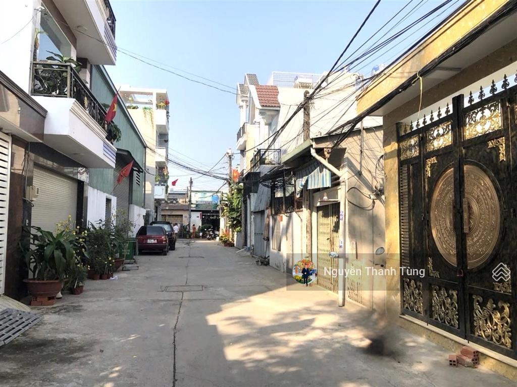 Gấp  nhà 4 tầng hẻm xe hơi 6m 1/ ngắn đường lê văn khương, quận 12, dt 100m2, gần chung cư võ đình
