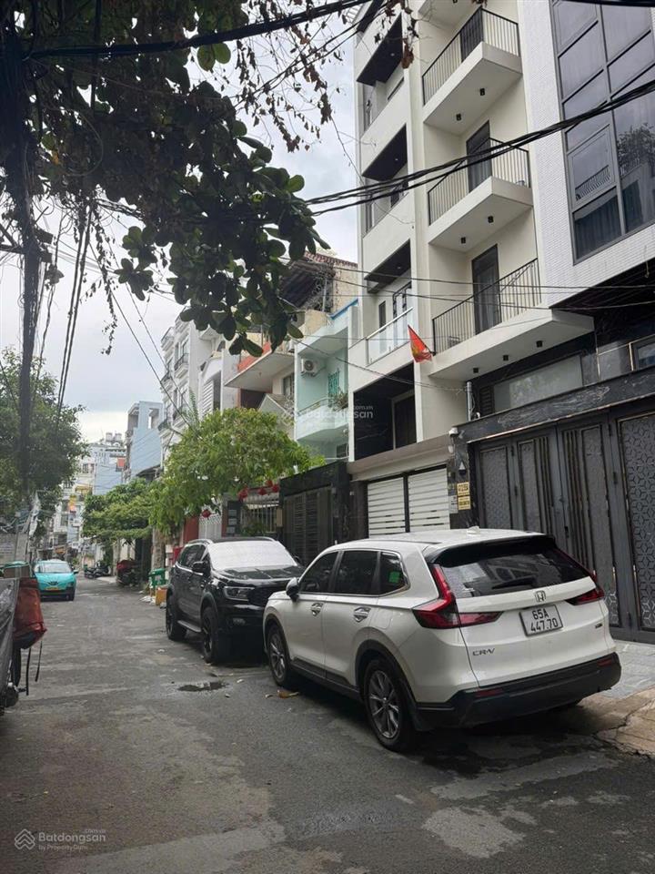 Nhà 7 tầng có thang máy ! bán nhà bùi đình túy 80m2 nở hậu 4.6m mới cứng hẻm xe hơi đỗ cửa 17 tỷ tl