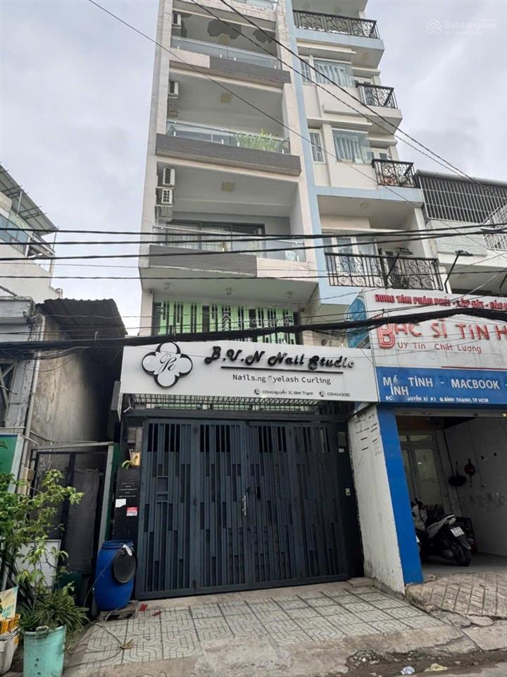 Kẹt bank! bán tòa chdv 50 triệu/th có thang máy mặt tiền 359d nguyễn xí  đặng thùy trâm hầm 6 tầng
