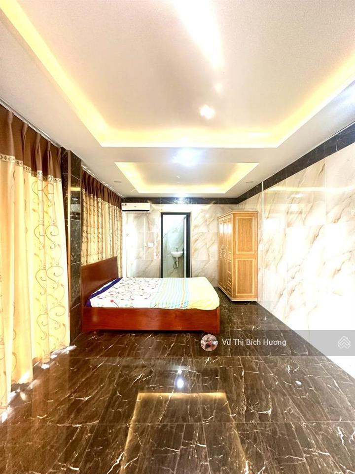 Nhà mtkd ngô gia tự  nguyễn duy dương  7 tầng  ngang 4.1m  46m  giá 21 tỷ