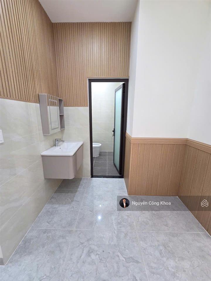 Bán nhà 100m2, hoàn công, sân ôtô, phòng ngủ dưới, gần ngã 6 an phú, p. an phú, tp. thuận an