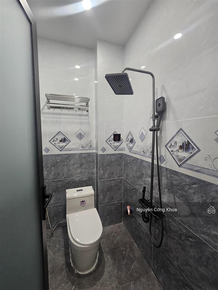 Bán nhà đẹp hoàn công, sân ôtô, phòng ngủ dưới, ngay chợ thành nam 50m, p. an phú, thuận an