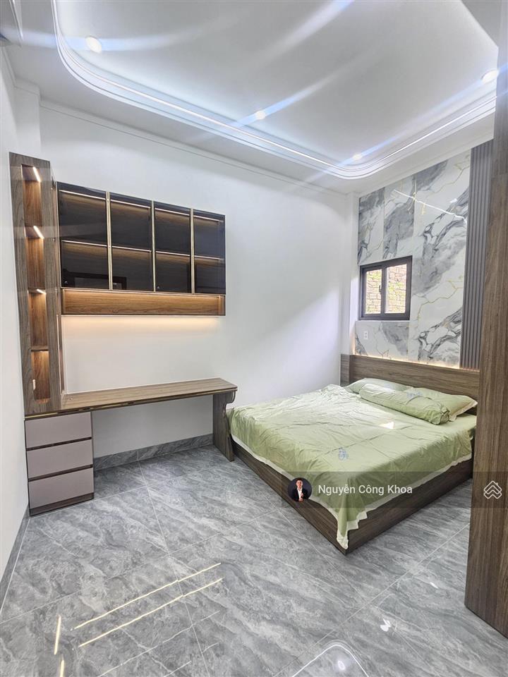 Bán nhà đẹp hoàn công, sân ôtô, phòng ngủ dưới, ngay chợ thành nam 50m, p. an phú, thuận an