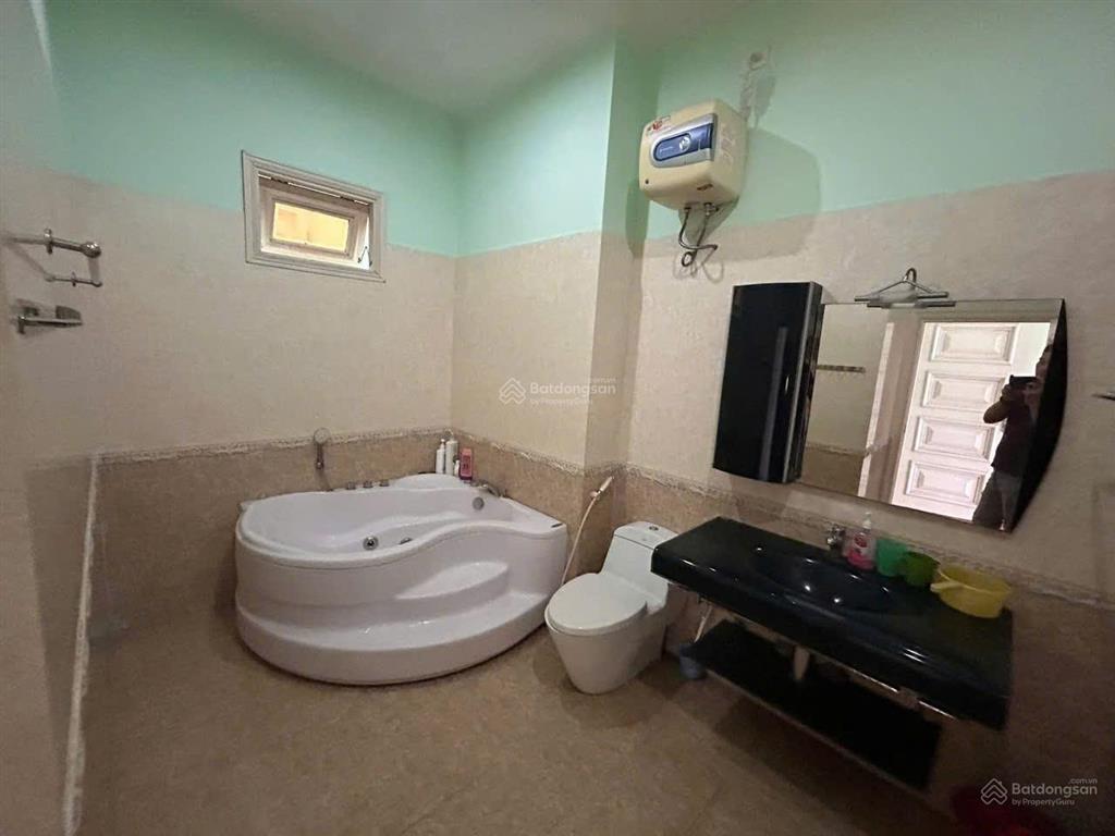 Bán nhà 4,5 tầng kẹp cống thoáng đường lê thước gần công viên hồ nghinh  biển mỹ khê giá tốt