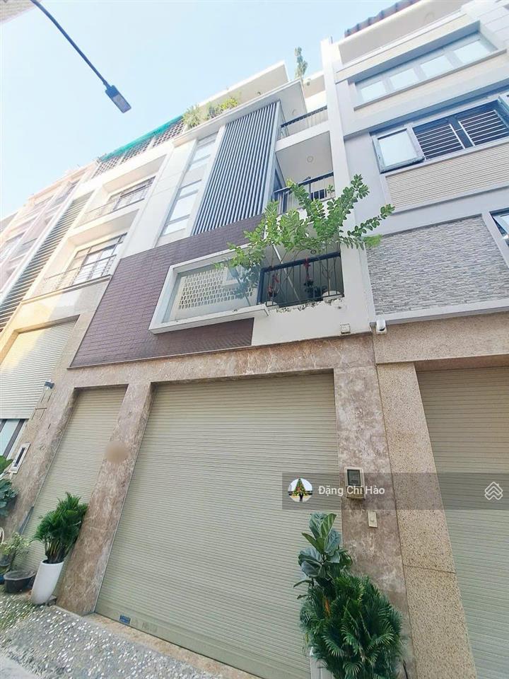 Nhà mới hẻm xe hơi 7 chỗ lạc long quân  ngang lớn 6m, 5 tầng  tặng nội thất cao cấp