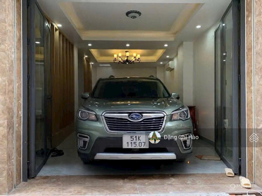 Nhà mới hẻm xe hơi 7 chỗ lạc long quân  ngang lớn 6m, 5 tầng  tặng nội thất cao cấp