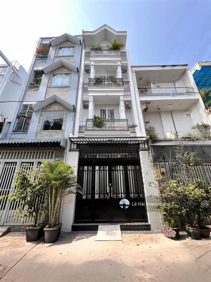 10,8 tỷ  sát lữ gia (4x14m, 4 tầng  nhà mới ở liền)  đường 7m, xe hơi vào nhà  giá tốt