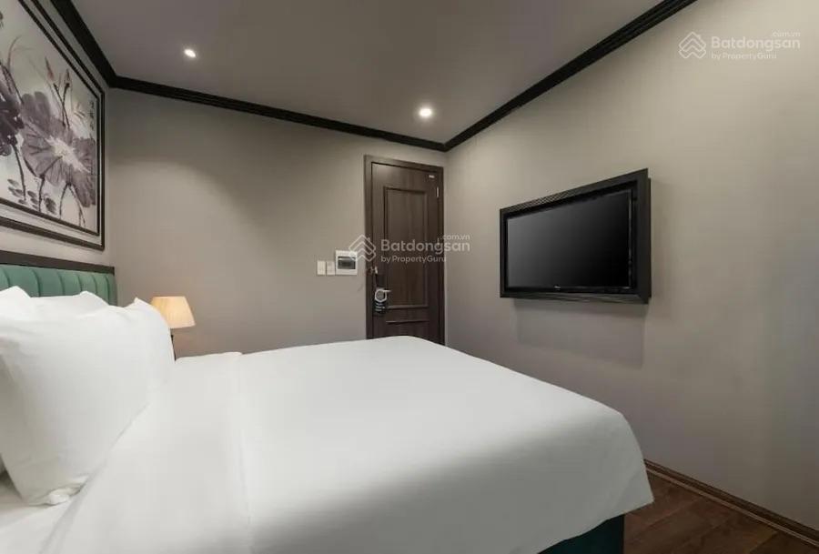 Cần bán tòa nhà khách sạn mặt phố hồng tiến, dt 836,5m2, xây 12 tầng 2 hầm 156 phòng