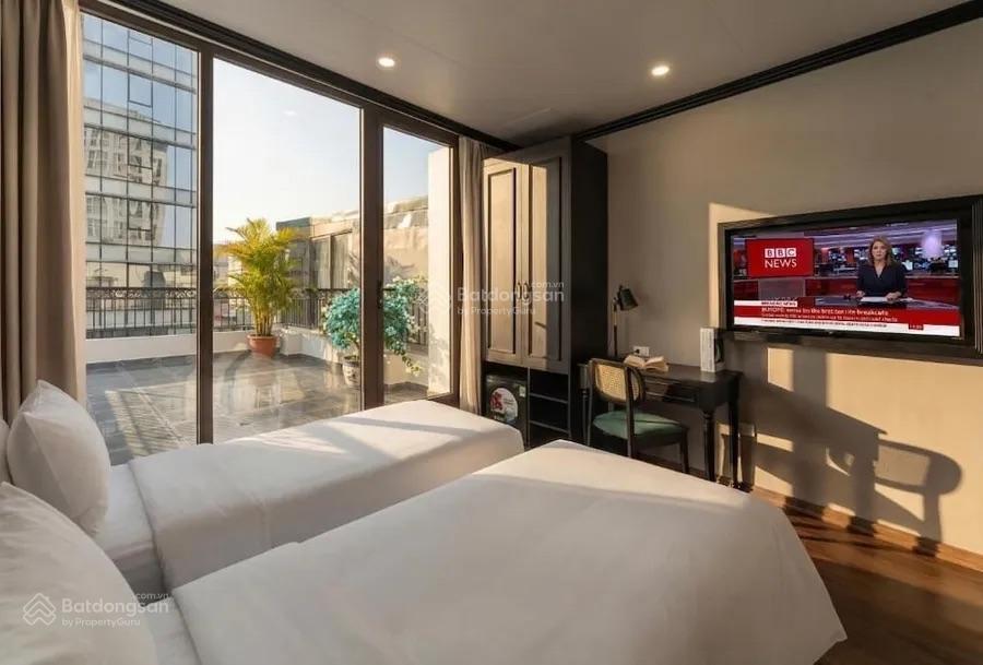 Cần bán tòa nhà khách sạn mặt phố hồng tiến, dt 836,5m2, xây 12 tầng 2 hầm 156 phòng
