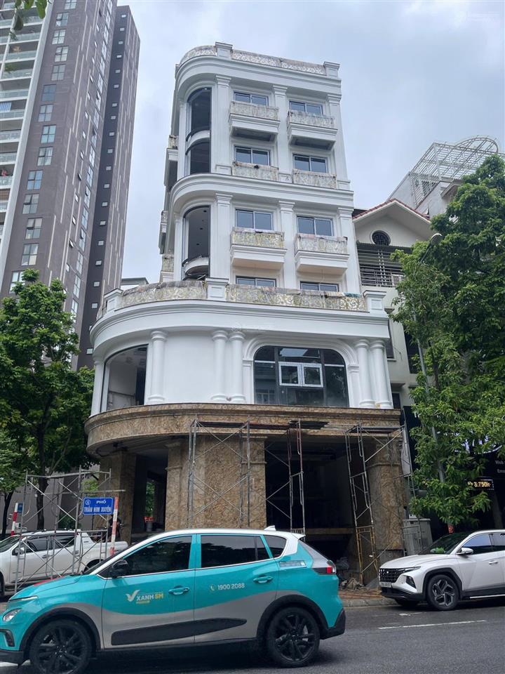 Toà nhà phố trung hoà gần vũ phạm hàm 54 tỷ 100m2 mặt tiền 7,3m 8 tầng có hầm cho thuê cao