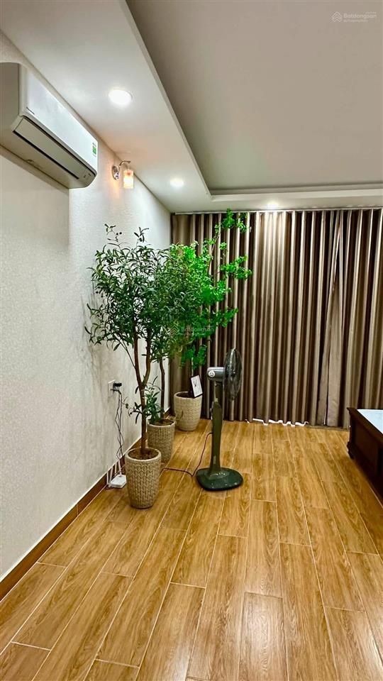Bán nhà 4 tầng  5 phòng ngủ  ô tô ngủ trong nhà ngay chợ lạc quan