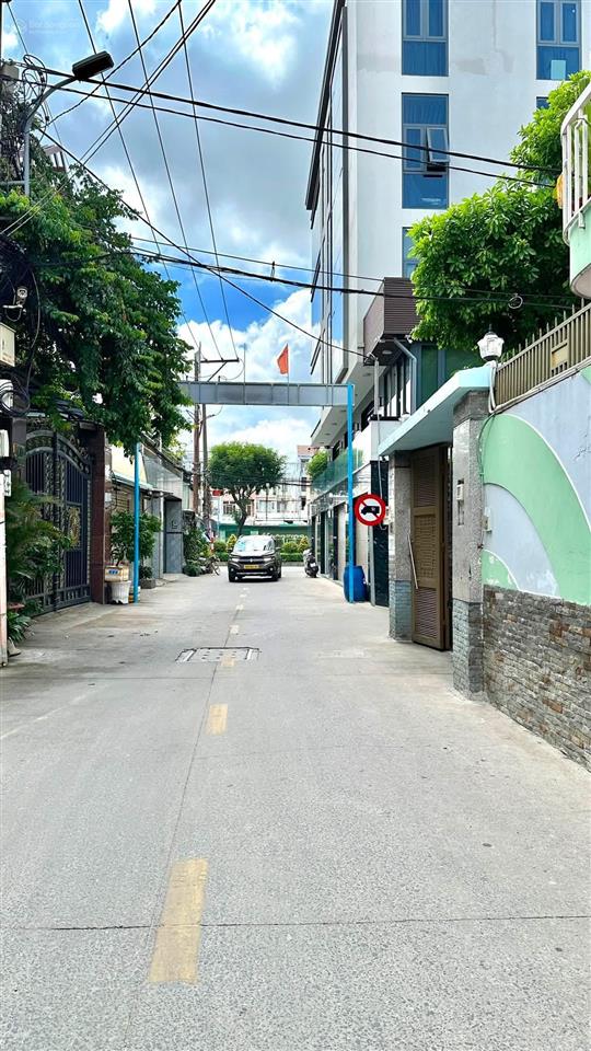 Bán nhà 4 tầng  5 phòng ngủ  ô tô ngủ trong nhà ngay chợ lạc quan