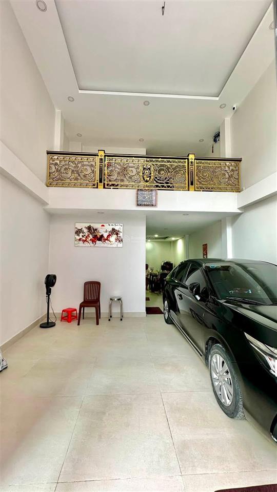 Bán nhà 4 tầng  5 phòng ngủ  ô tô ngủ trong nhà ngay chợ lạc quan