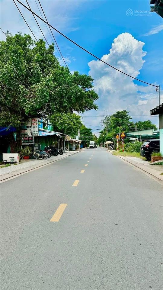 Bán đất thổ cư dt 105m2 sổ hồng riêng mặt tiền đường nhựa, xã bà điểm mới