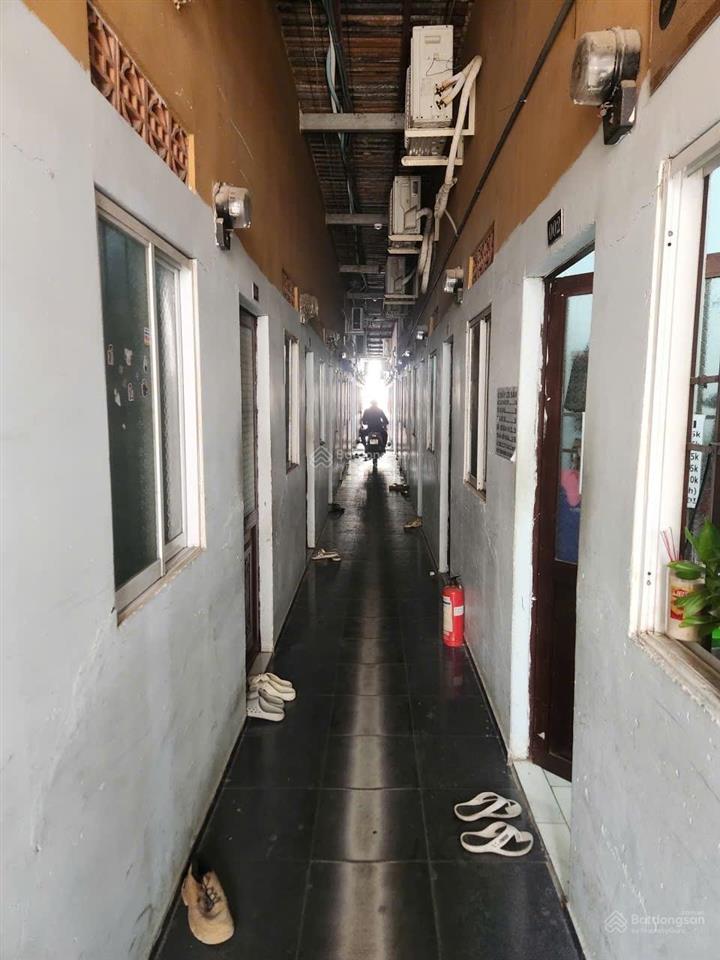 Quận 7 1200m2 thổ cư sẵn 2 căn mt + 100 phòng trọ  hệ số xd cao  dòng tiền 3,6 tỷ/năm