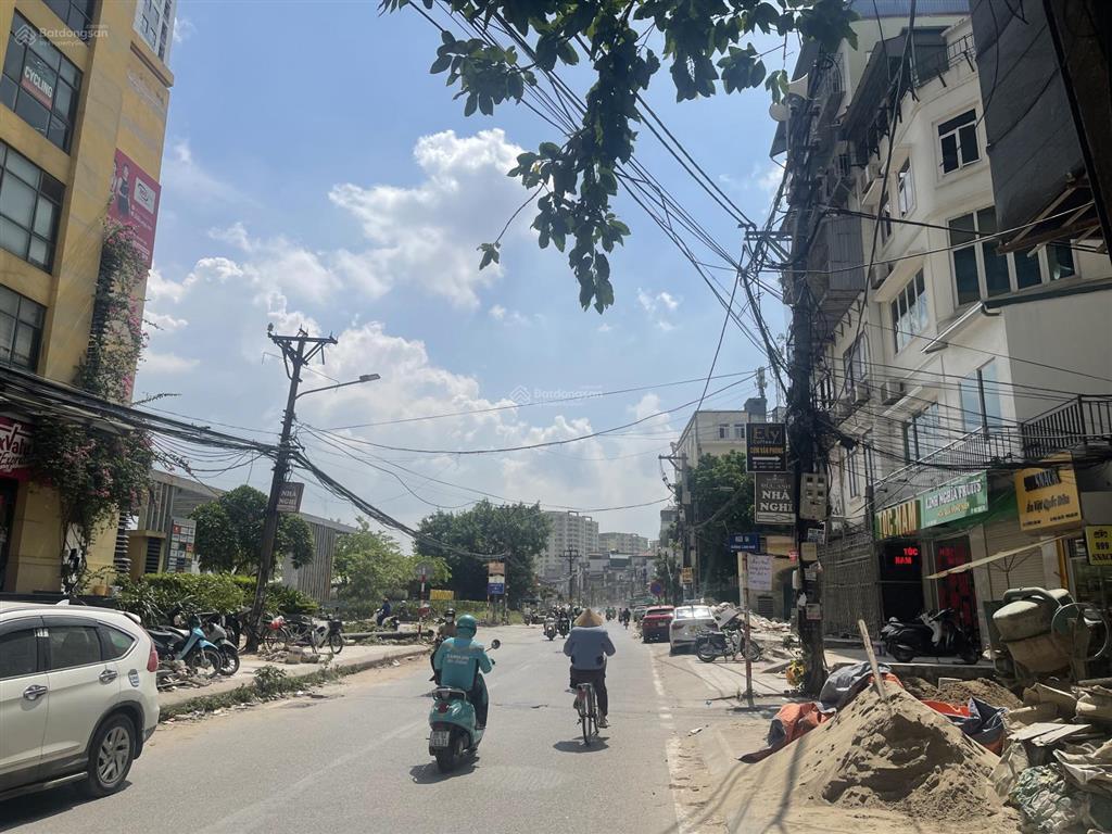 Bán nhà mặt phố lĩnh nam  dt 100 mét  5 tầng  mặt tiền rộng  vỉa hè  giá 31,9 tỷ