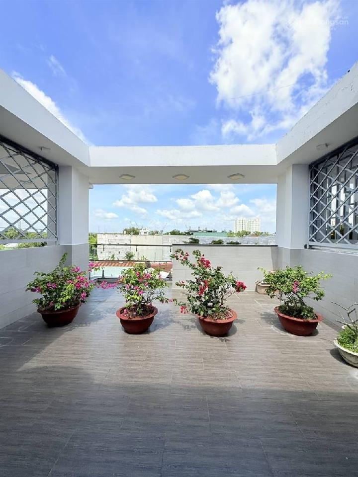 C chủ gửi bán nhà 4 tầng st/ hxh sân rộng gần mt nguyễn thị thập chợ tân mỹ