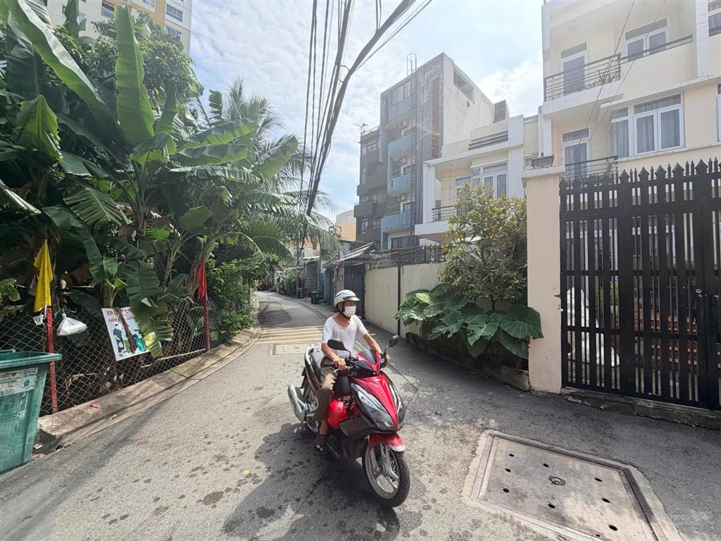 Nhà mặt tiền đường 61 thảo điền đường hiện hữu 5m  đường dự mở rộng trước nhà 12m ra 2 mặt tiền