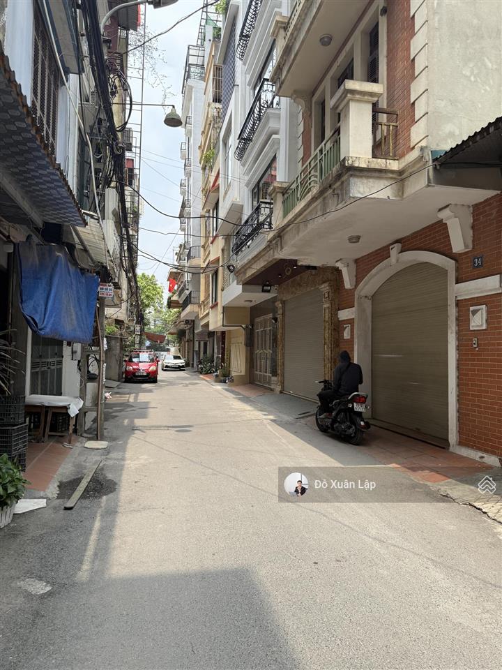 Bán nhà ngõ 180 hoàng quốc việt, 2 ô tô tránh, thang máy, lô góc, nhà mới đẹp. dt 76m2, 23 tỷ