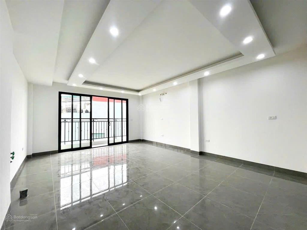 Nhà mới đỗ nhuận 45m2 x 7 tầng, thang máy, gara ô tô, 100m cv hòa bình, mt 4.8m, giá 14.8 tỷ