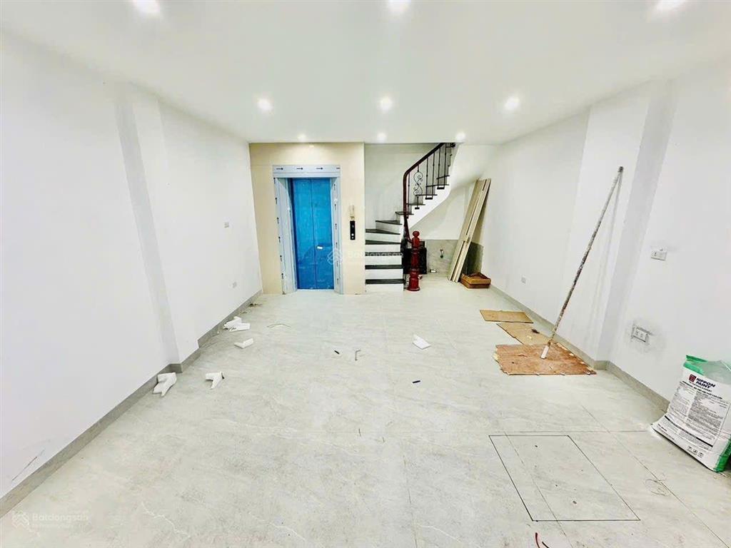 Nhà mới đỗ nhuận 45m2 x 7 tầng, thang máy, gara ô tô, 100m cv hòa bình, mt 4.8m, giá 14.8 tỷ