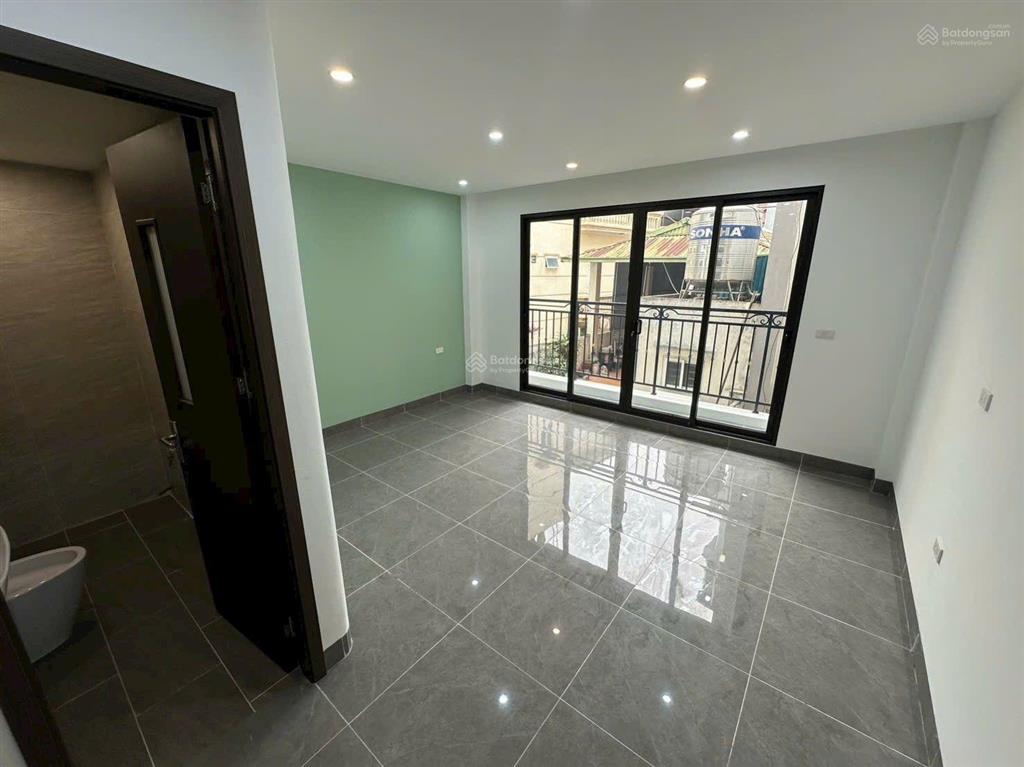 Nhà mới đỗ nhuận 45m2 x 7 tầng, thang máy, gara ô tô, 100m cv hòa bình, mt 4.8m, giá 14.8 tỷ