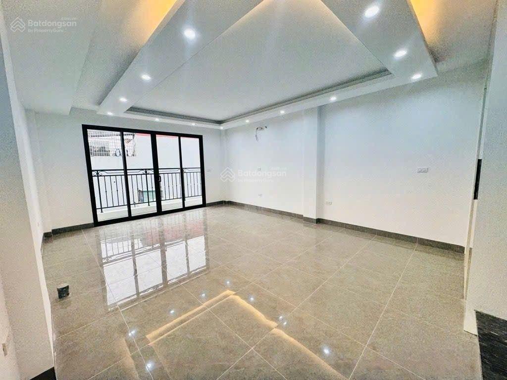 Nhà mới đỗ nhuận 45m2 x 7 tầng, thang máy, gara ô tô, 100m cv hòa bình, mt 4.8m, giá 14.8 tỷ