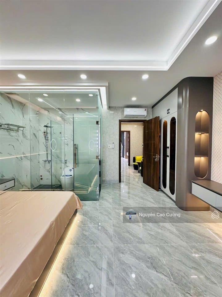 Nhà mặt tiền 5x20m thang máy 650kg, 1lững 5 lầu đường 10m thông, tân thới nhất 02 gần phan văn hớn