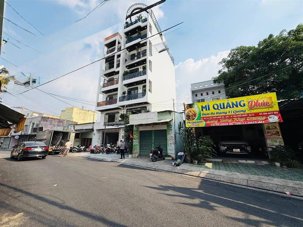 Nhà mặt tiền 5x20m thang máy 650kg, 1lững 5 lầu đường 10m thông, tân thới nhất 02 gần phan văn hớn