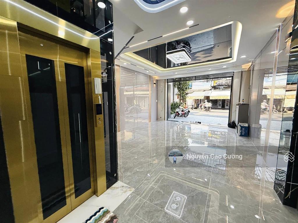 Nhà mặt tiền 5x20m thang máy 650kg, 1lững 5 lầu đường 10m thông, tân thới nhất 02 gần phan văn hớn
