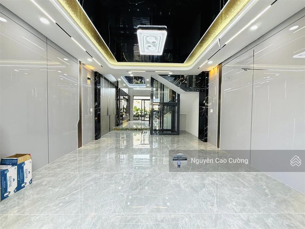 Nhà mặt tiền 5x20m thang máy 650kg, 1lững 5 lầu đường 10m thông, tân thới nhất 02 gần phan văn hớn