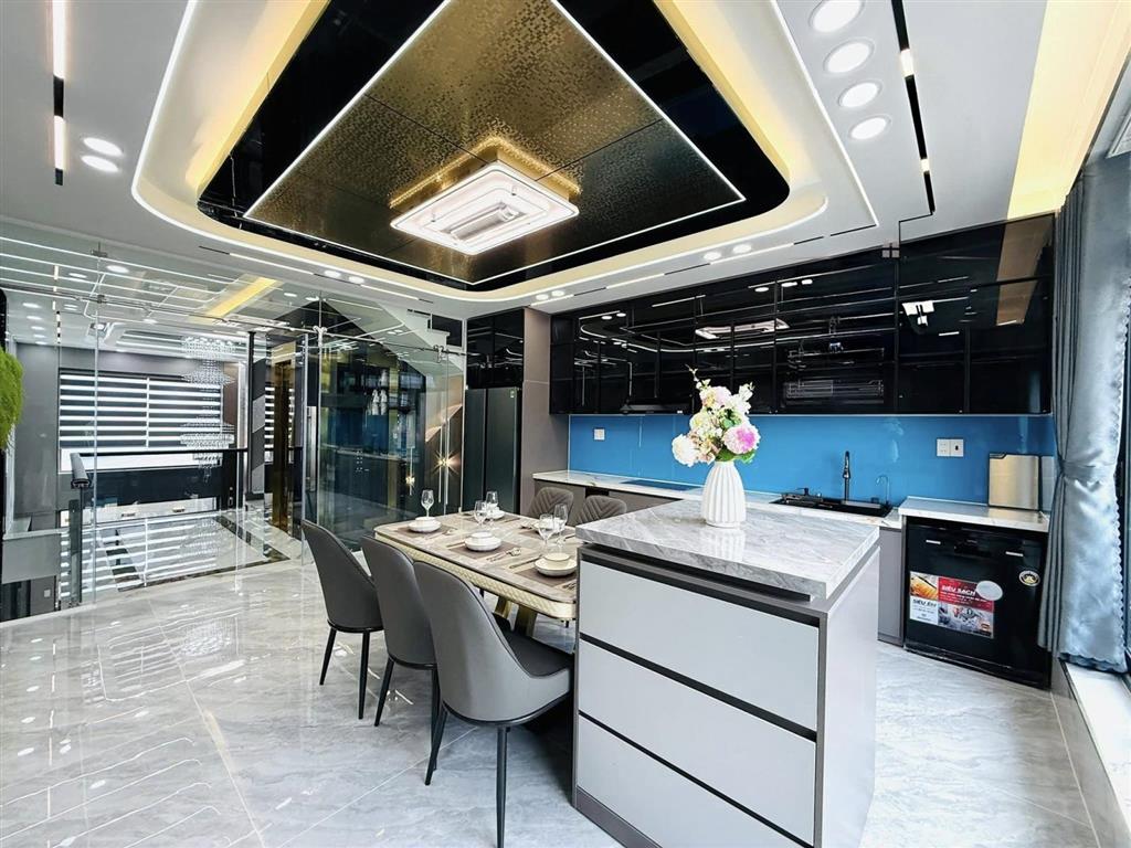 Nhà mặt tiền 5x20m thang máy 650kg, 1lững 5 lầu đường 10m thông, tân thới nhất 02 gần phan văn hớn